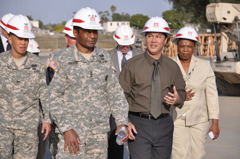 Lt. Gen. Thomas Bostick, U.S. Army Deputy Chief of Staff, G-1, is briefed by Resident Engineer Mike Siu on construction work by the Corps at Joint Forces Training Base Los Alamitos during a visit May 18. District Commander Col. Mark Toy (far left) and Military Programs Branch Chief Debra Ford (far right) look on.  Bostick is set to become the 53rd Chief of Engineers and commander of the U.S. Army Corps of Engineers May 22.