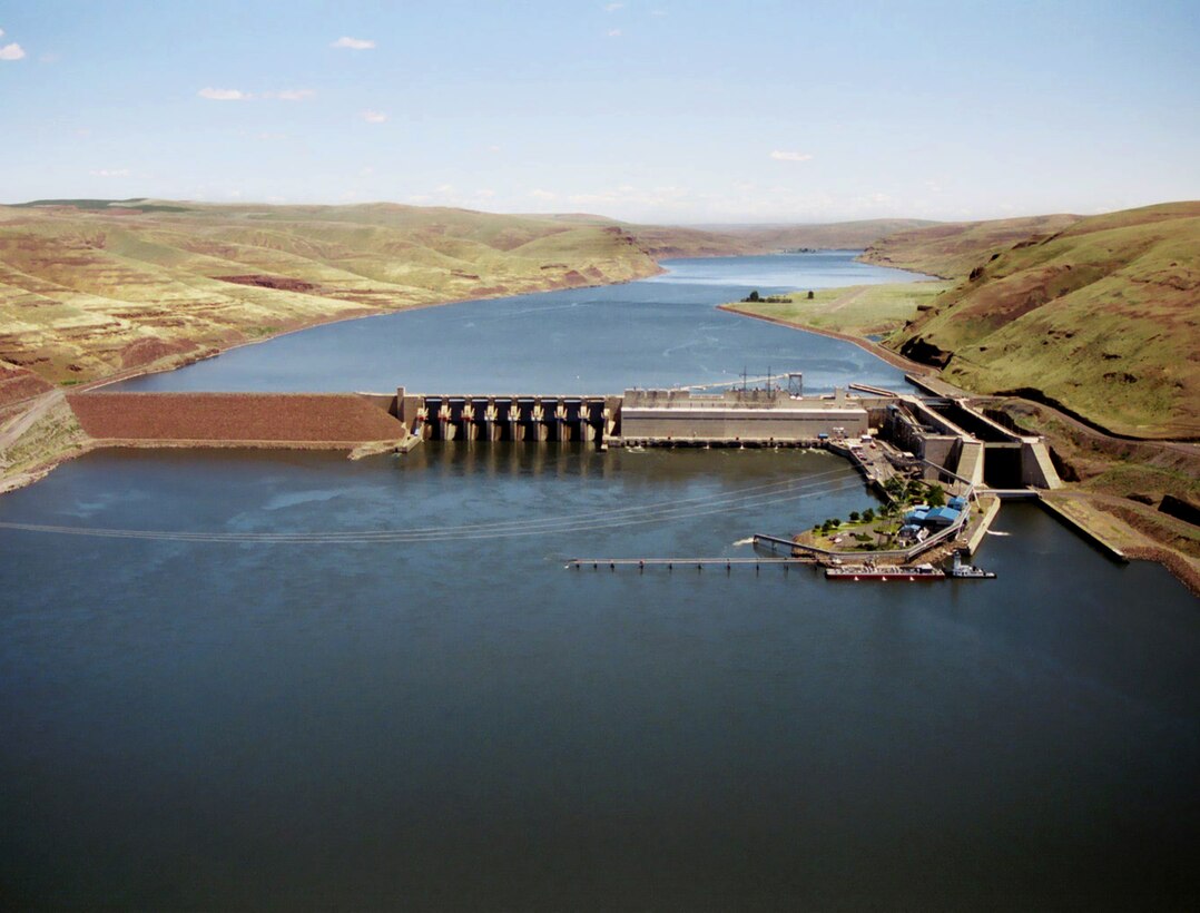 The dam is 2,655 feet long with an effective height of about 100 feet. It is located on the Snake River near Starbuck, Wash., and upstream of Lake West, the reservoir formed by Lower Monumental Dam. It is a concrete gravity dam with an earthfill abutment embankment. It includes a navigation lock and eight-bay spillway 512 feet long, which has eight 50 feet by 60 feet tainter gates.