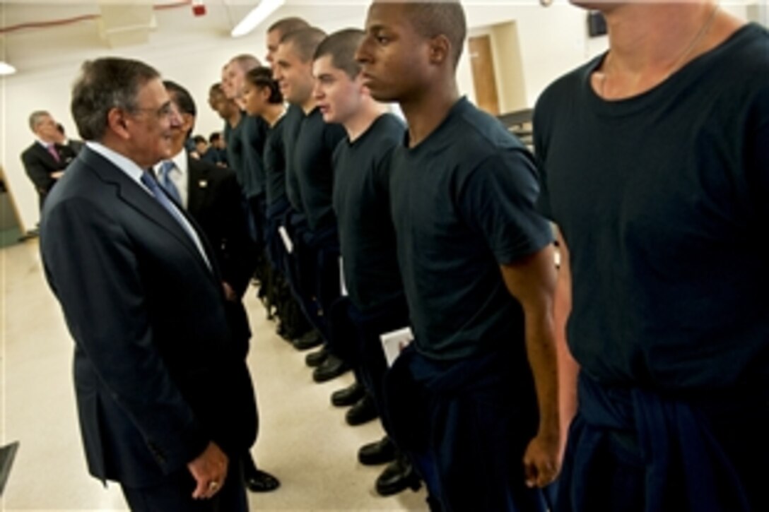 Defense Secretary Leon E. Panetta greets Navy recruits at the USS Red Rover facility at the Captain James A. Lovell Federal Health Care Center in North Chicago, Ill., May 21, 2012. Panetta and Veterans Affairs Secretary Eric K. Shinseki toured the facility, which provides complete medical and dental examinations to all recruits before entering Great Lakes Recruit Training.