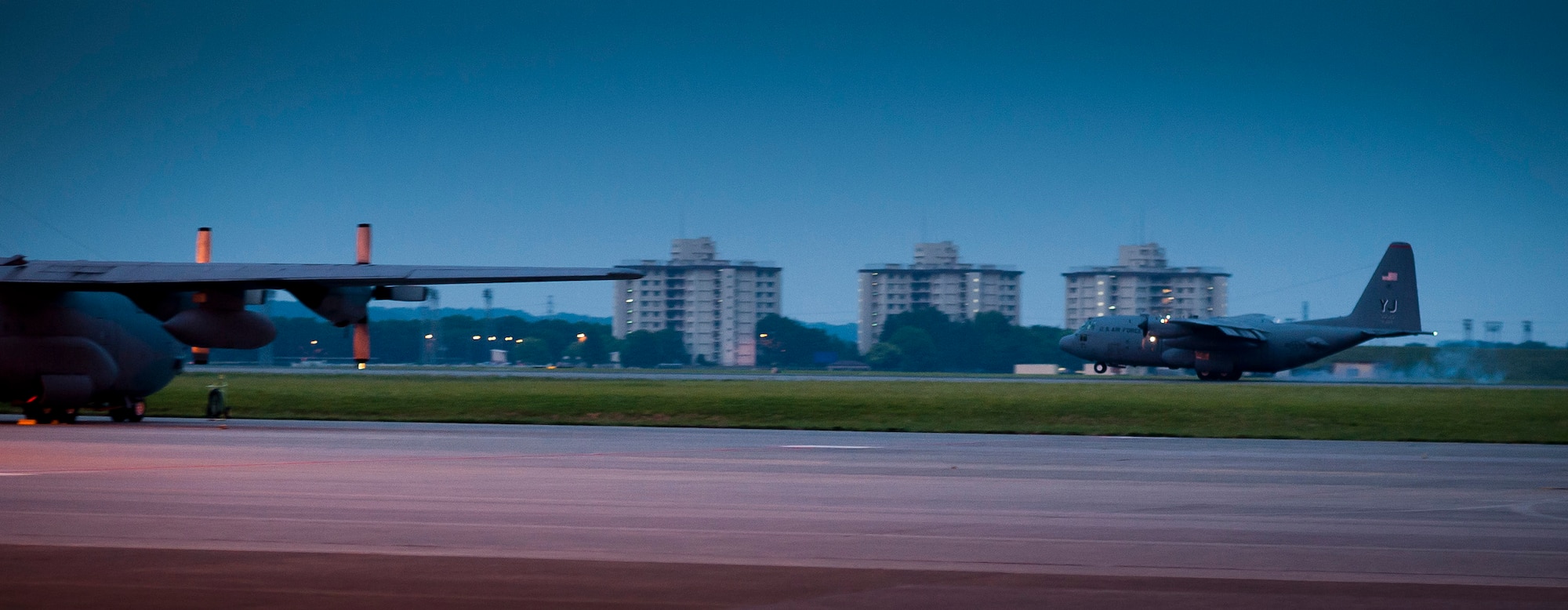YOKOTA AIR BASE, Japan -- A C-130 Hercules from the 36th Airlift Squadron lands May 19, 2012, at Yokota Air Base, Japan, for the first time in four months following a deployment to Southwest Asia. (U.S. Air Force photo by Staff Sgt. Samuel Morse)