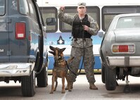 Army Sgt. Brian Pate, 178th Military Police Detachment, Fort Hood, Texas, and his dog, Eenzo, prepare to compete in the explosive detection event during the 2012 Department of Defense Military Working Dog K-9 Trials May 3 at Joint Base San Antonio-Lackland. Hosted by the 341st Training Squadron here, the four-day event pitted 43 teams from the U.S. Army, Air Force, Navy and Marine Corps in competition to determine the top military handlers and working dogs in the DOD. (U.S. Air Force photo/Robbin Cresswell)