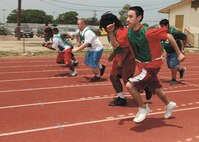 Special Olympians compete in the 50-meter race May 5 at Harlandale Memorial Stadium. (U.S. Air Force photo/Robbin Cresswell)