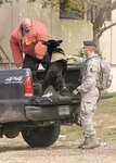 U.S. Air Force Staff Sgt. Joshua Aleprete and his 8-year-old Belgian Malinois, Nero, a patrol and narcotics detection dog, confront Army Staff Sgt. Steven Ramil, a military working dog trainer assigned to the 341st Training Squadron, May 4 during the 2012 Department of Defense K-9 Trials at Joint Base San Antonio-Lackland. Ramil served as a decoy during the Handler Protection/Vehicle Traffic Stop event. Aleprete is assigned to the 11th Security Forces Group, Joint Base Andrews, Md. Hosted by the 341st TRS, the four-day event pitted 43 teams from the U.S. Army, Air Force, Navy and Marine Corps in competition to determine the top military handlers and dogs in the DOD. (U.S. Air Force photo/Robbin Cresswell)