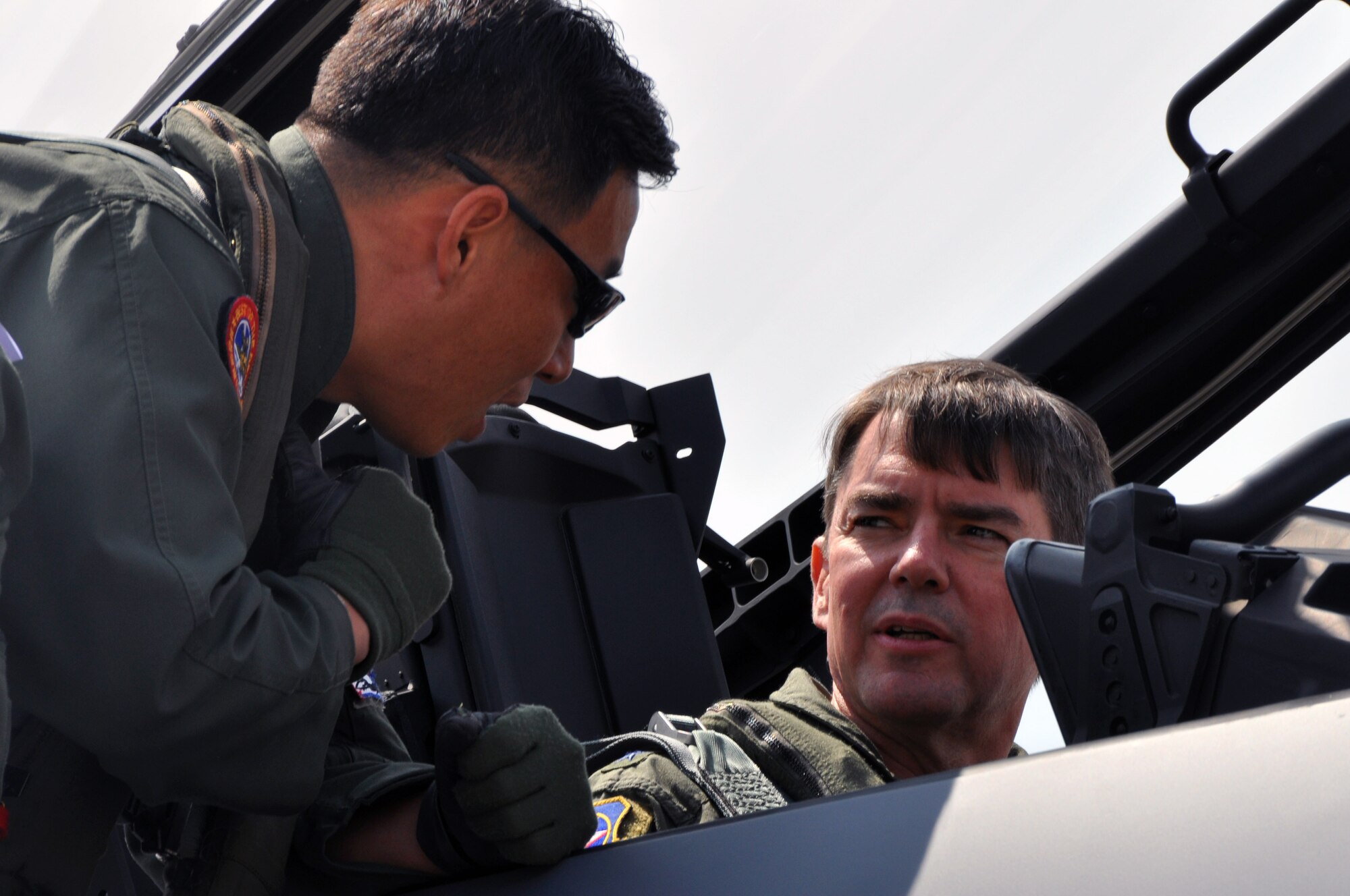 Lt. Gen. Jan-Marc Jouas, 7th Air Force commander, receives a brief before flying in a Republic of Korea F-15K Slam Eagle at Gwangju Air Base, May 15, 2012. Jouas’s flight comes as part of Max Thunder, a two-week combined exercise putting the U.S. and ROK Air Forces to work together through a variety of scenarios simulating operations against a hostile force. (U.S Air Force photo/Airman 1st Class Michael Battles)