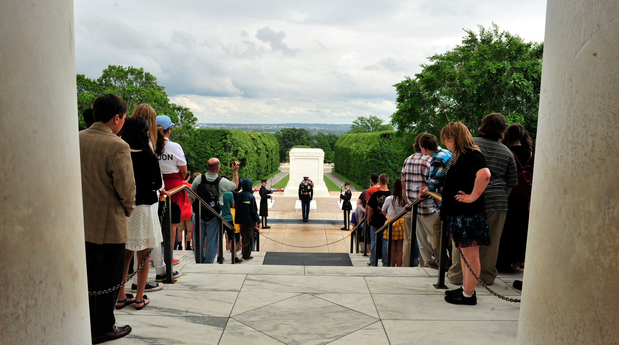 Audience member’s watch as the relief commander conducts a detailed inspection of the weapons during the Changing of the Guard ceremony at the Arlington National Cemetery in Washington D.C. The guard is changed every half hour in the summer months April 1 to September 30.  The tomb of the Unknown Soldier is guarded 24 hours a day, 365 days a year. (U.S. Air Force photograph/ Staff Sgt. Stephenie Wade)
