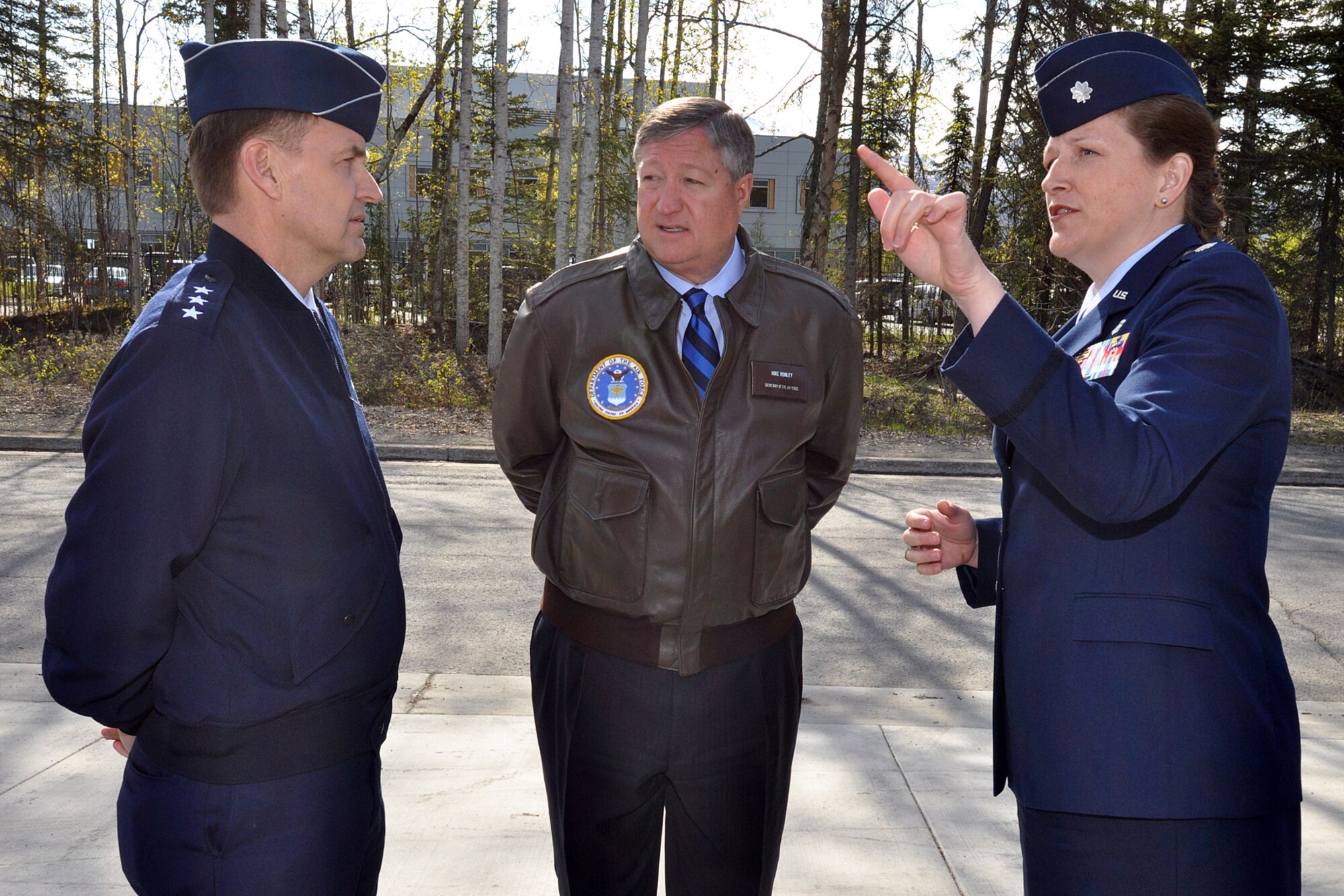 Lt. Col. Andrea Vinyard, 673d Medical Support Squadron commander, briefs Secretary of the Air Force Michael Donley and Lt. Gen. Stephen Hoog, commander of Alaskan Command, 11th Air Force and Alaskan North American Aerospace Defense Command Region, May 21, 2012, outside the Alaska Fisher House on Joint Base Elmendorf-Richardson, Alaska. Donley and his wife, Gail, visited JBER May 20 and 21 before they departed for Eielson Air Force Base near Fairbanks, Alaska.  (U.S. Air Force photo/John Pennell)