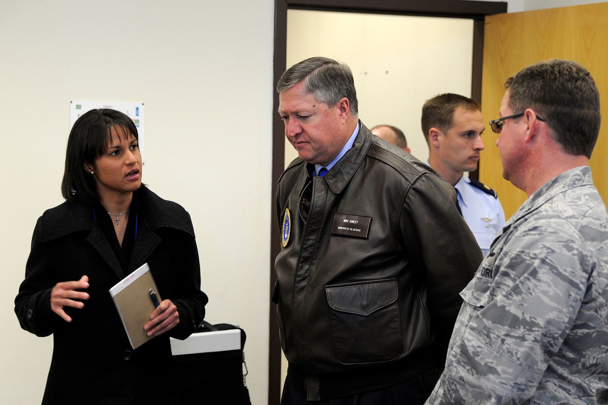 Darmaly Williams, Sexual Assault Response Coordinator, briefs Secretary of the Air Force Michael Donley May 21, 2012, on the sexual assault prevention program she runs at Joint Base Elmendorf-Richardson, Alaska. Donley visited JBER to speak to Airmen about the direction of the Air Force, visit them on the job and find out their concerns.  (U.S. Air Force photo/Staff Sgt. Zachary Wolf)