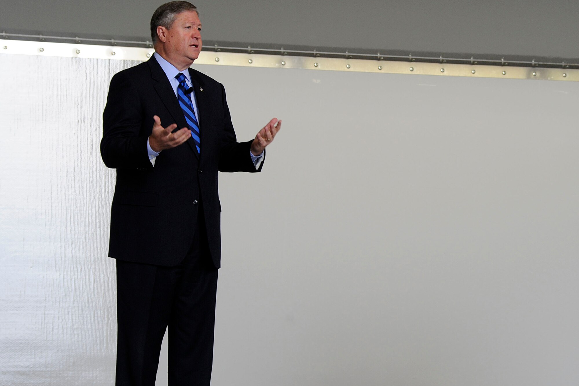 Secretary of the Air Force Michael Donley addresses Airmen May 21, 2012, inside Hangar 21 at Joint Base Elmendorf-Richardson, Alaska. Donley visited JBER to speak to Airmen about the direction of the Air Force, visit them on the job and find out their concerns.  (U.S. Air Force photo/Staff Sgt. Zachary Wolf)