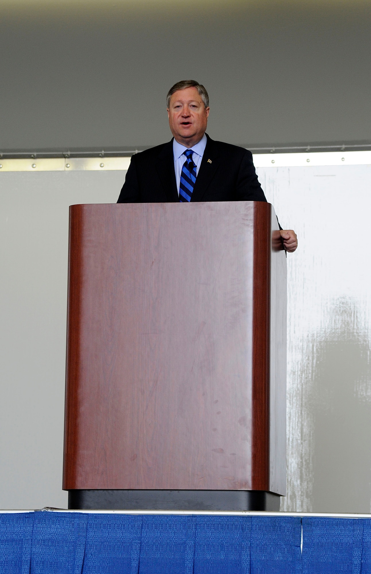 Secretary of the Air Force Michael Donley addresses Airmen May 21, 2012, inside Hangar 21 at Joint Base Elmendorf-Richardson, Alaska. Donley visited JBER to speak to Airmen about the direction of the Air Force, visit them on the job and find out their concerns.  (U.S. Air Force photo/Staff Sgt. Zachary Wolf)