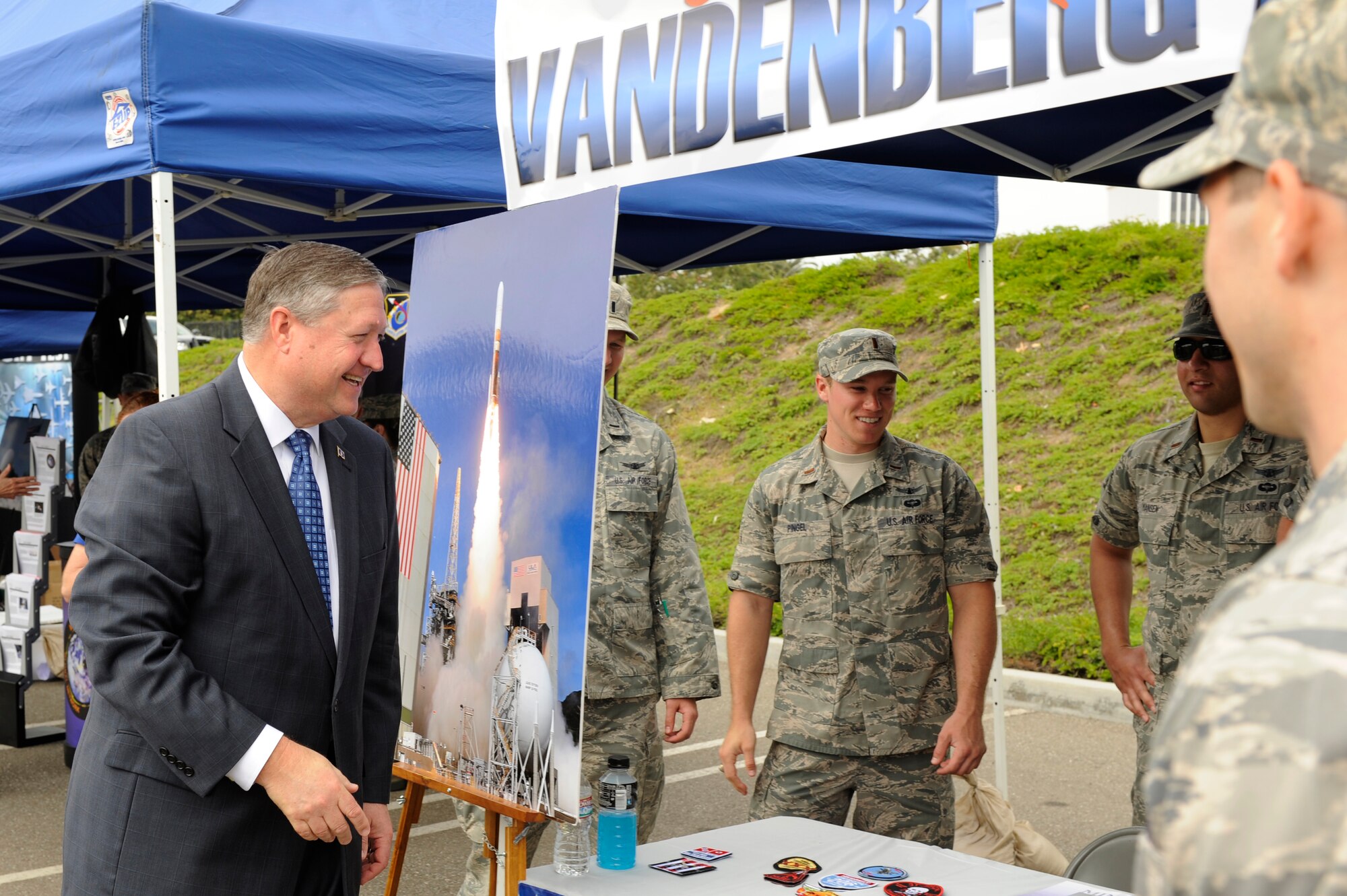 TORRANCE, Calif. -- Secretary of the Air Force Michael Donley looks over Vandenberg Air Force Base's public display at the Torrance 53rd Annual Armed Forces Day Celebration May 19, 2012, in Torrance, Calif. Donley was the Grand Marshal for the day's activities, which included a reveille ceremony, barbecue and military parade. Approximately 325 Airmen from Vandenberg AFB, Los Angeles AFB and Edwards AFB marched in the parade observed by more than 100,000 spectators. (U.S. Air Force photo/Staff Sgt. Levi Riendeau)