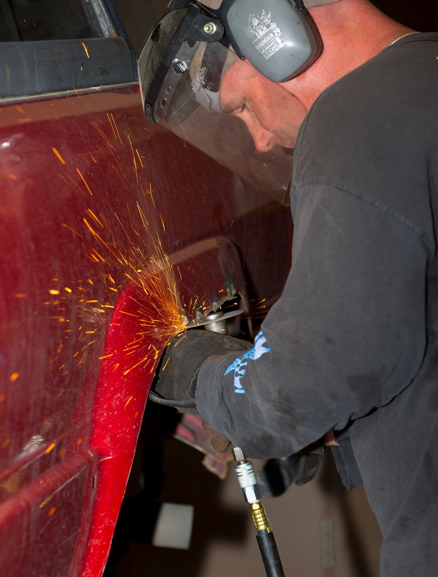 HOLLOMAN AIR FORCE BASE, N.M. - Master Sgt. James (last name withheld) the acting first sergeant for the 29th Attack Squadron, works on his Toyota 4-Runner May 19. Jim uses the auto shop on base to perform maintenance on his vehicle. (U.S. Air Force photo by Airman Leah Ferrante/Released) 