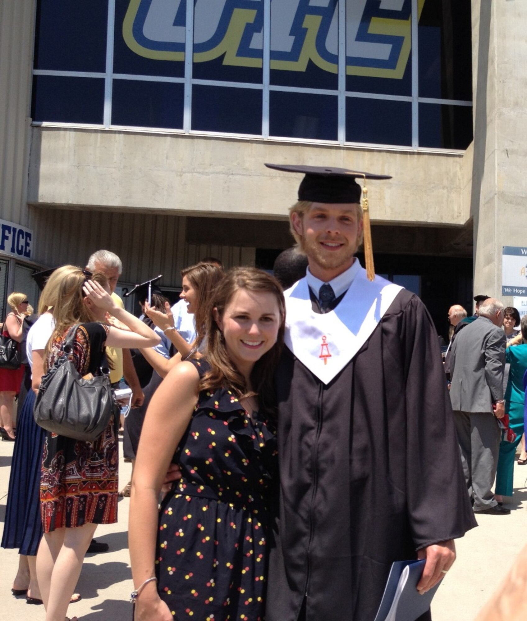 From left, Amanda Wiser poses for a photo with her husband, Aaron Wiser, who graduated May 5 from the University of Tennessee at Chattanooga with a bachelor’s degree in mechanical engineering. Aaron has worked at AEDC as an ATA Design Engineering Branch draftsman since 2005. (Photo provided)