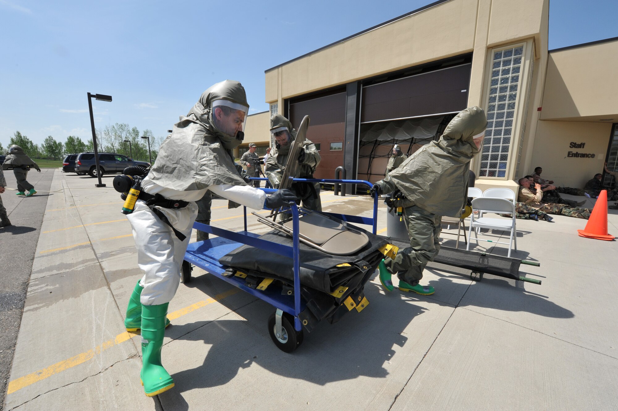 MINOT AIR FORCE BASE, N.D. -- Airmen from the 5th Medical Group stage a decontamination zone during a major accident response exercise here May 17. The exercise was designed to test the readiness and effectiveness of medical contingency response plan procedures. (U.S. Air Force photo/Senior Airman Brittany Y. Auld)