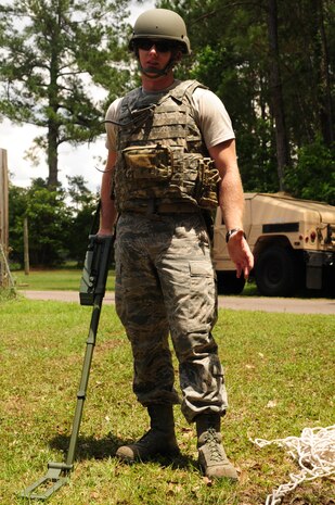Airman 1st Class Robert Hardy, Explosive Ordnance Disposal journeyman from the 628th Civil Engineer Squadron, out of Joint Base Charleston, S.C., uses a mind detector as part of a training scenario May 21, 2012. This scenario, which involves identifying different UXO's, is a part of Hardy's 5-level upgrade training.  (U.S. Air Force photo/ Airman 1st Class Chacarra Walker)