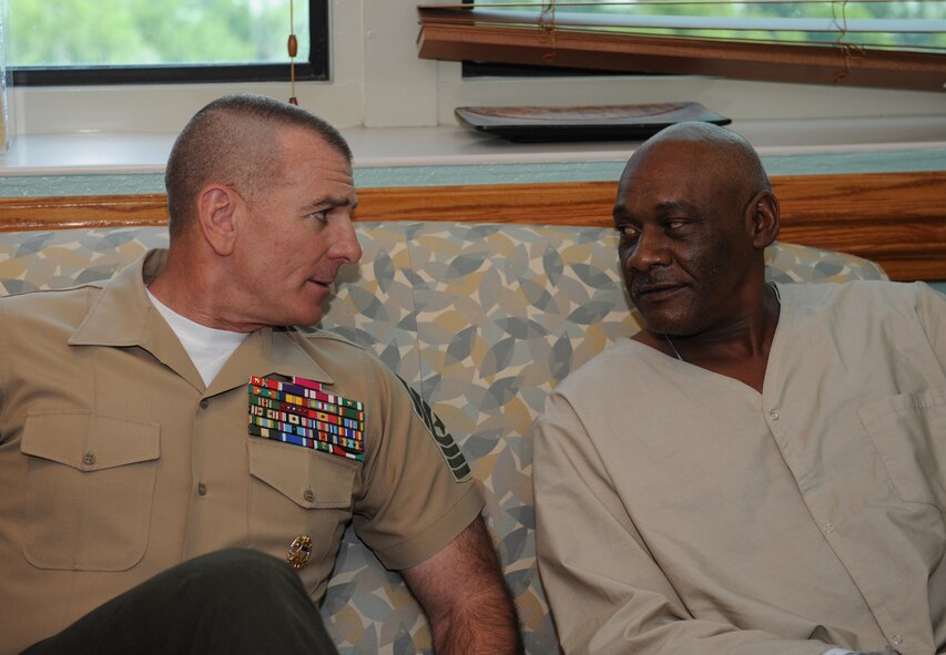 U.S. Marine Corps Sgt. Maj. Bryan Battaglia, senior enlisted advisor to the chairman of the Joint Chiefs of Staff, speaks with a U.S. Marine Corps veteran at the Overton Brooks VA Medical Center in Shreveport, La., May 21. Battaglia spoke with veterans at the medical center to gain a better understanding of life after the military as well as talk about the type of treatment they receive at the facility. (U.S. Air Force photo/Airman 1st Class Benjamin Gonsier)(RELEASED)
