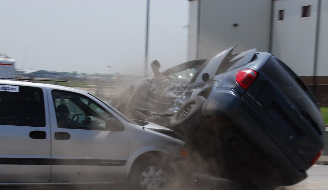 Two demonstration vehicles intersect as part of a mock collision at Niagara
Falls Air Reserve Station May 22, 2012. The crash was a demonstration during
the annual Traffic Safety week put on for area high schools by federal,
state and community organizations. (U.S. Air Force photo by Senior Airman Ron
Dombkowski)
