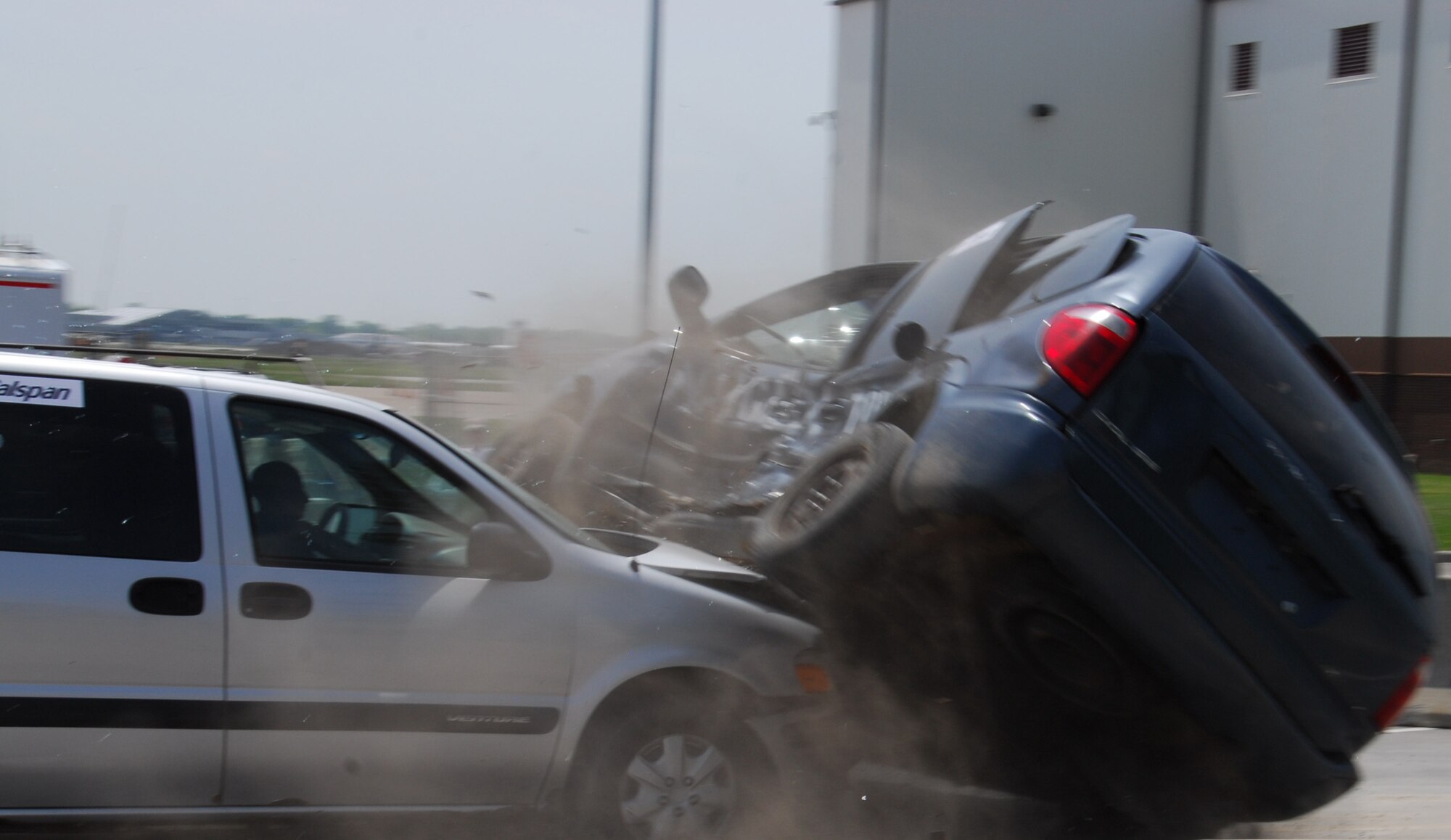 Two demonstration vehicles intersect as part of a mock collision at Niagara
Falls Air Reserve Station May 22, 2012. The crash was a demonstration during
the annual Traffic Safety week put on for area high schools by federal,
state and community organizations. (U.S. Air Force photo by Senior Airman Ron
Dombkowski)
