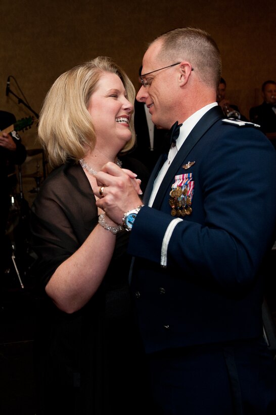 Col. Mark Weatherington, 28th Bomb Wing commander, and his wife, Stephanie, dance to music provided by the U.S. Air Force Heartland of America Band during the Ellsworth 70th Anniversary Celebration Dinner in Rapid City, S.D., May 19, 2012. The event was the pinnacle of a number of events conducted throughout the week celebrating Ellsworth’s colorful 70-year history. (U.S. Air Force photo by Airman 1st Class Kate Thornton/Released)