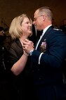 Col. Mark Weatherington, 28th Bomb Wing commander, and his wife, Stephanie, dance to music provided by the U.S. Air Force Heartland of America Band during the Ellsworth 70th Anniversary Celebration Dinner in Rapid City, S.D., May 19, 2012. The event was the pinnacle of a number of events conducted throughout the week celebrating Ellsworth’s colorful 70-year history. (U.S. Air Force photo by Airman 1st Class Kate Thornton/Released)