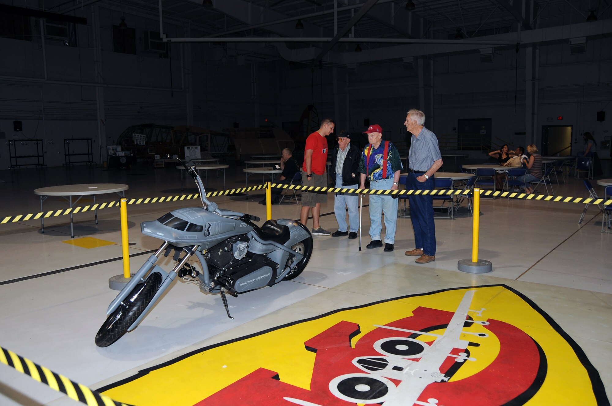 Veterans from the Missouri Veterans Home, Warrenburg, Mo., check out the B-2 chopper on display at the Twilight Show, May 18. The WOW airshow, May 19-20, featured dozens of aircraft performances and static displays. (U.S. Air Force photo/Staff Sgt. Lauren Padden)