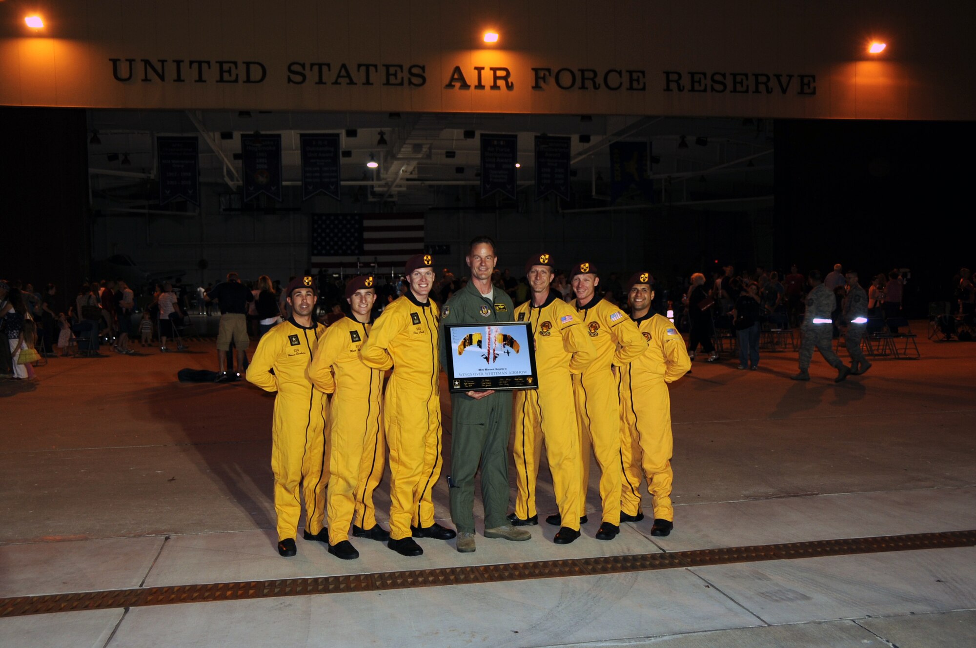 The Golden Knights, Army parachute demonstration team, performed at the Twilight Show, May 18, prior to Wings Over Whiteman. The WOW airshow featured dozens of aircraft performances and static displays. (U.S. Air Force photo/Staff Sgt. Lauren Padden)