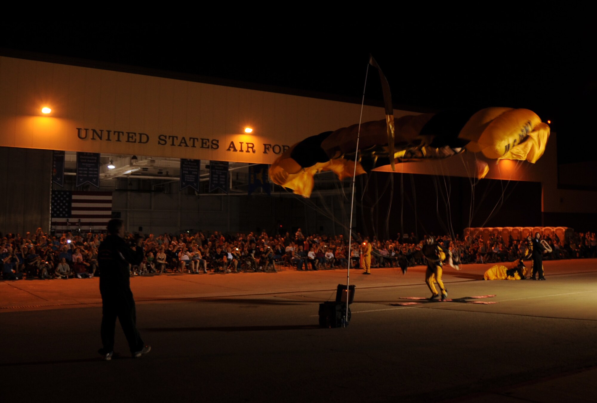 The Golden Knights, Army parachute demonstration team, performed at the Twilight Show, May 18, prior to Wings Over Whiteman. The WOW airshow featured dozens of aircraft performances and static displays. (U.S. Air Force photo/Staff Sgt. Lauren Padden)