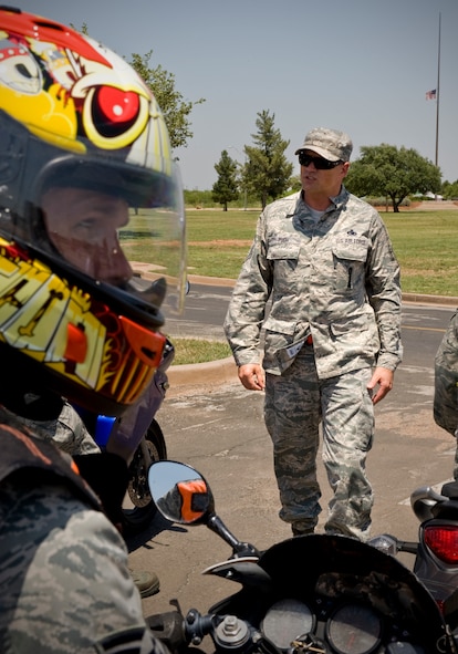 U.S. Air Force Senior Master Sgt. Wendell Pugh, 7th Munitions Squadron, briefs motorcyclists before a safety ride May 18, 2012, at Dyess Air Force Base, Texas. The safety briefing was hosted by the Green Knights Motorcycle Club encouraging safety through mentorship during the 101 Critical Days of Summer. (U.S. Air Force photo by Airman 1st Class Jonathan Stefanko/ Released)