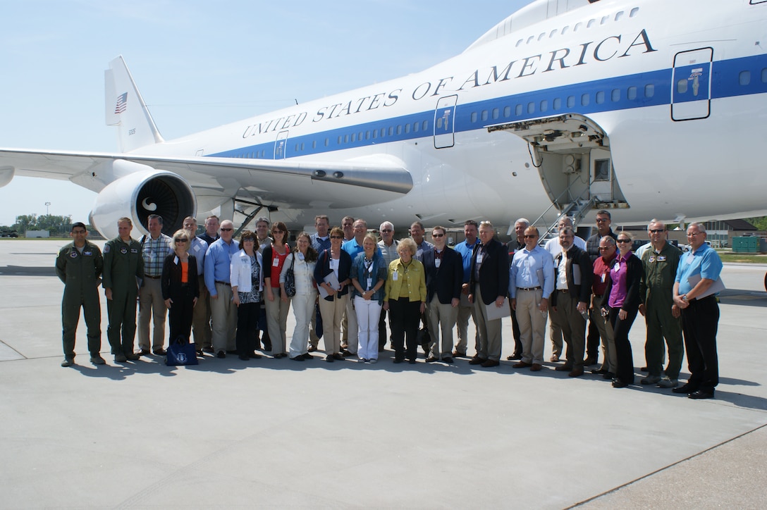 Base and civic leaders from Wichita Falls, Texas, Altus, Okla. and Enid, Okla., pose for a group photo after touring the E-4B Nightwatch aircraft, which serves as the National Airborne Operations Center platform at Offutt Air Force Base, Neb., on May 18, 2012. The civic leaders took tours of Sheppard, Altus, Dover and Offutt Air Force Bases to enhance their understanding of the global Air Force mission. (U.S. Air Force photo/Dan Hawkins)