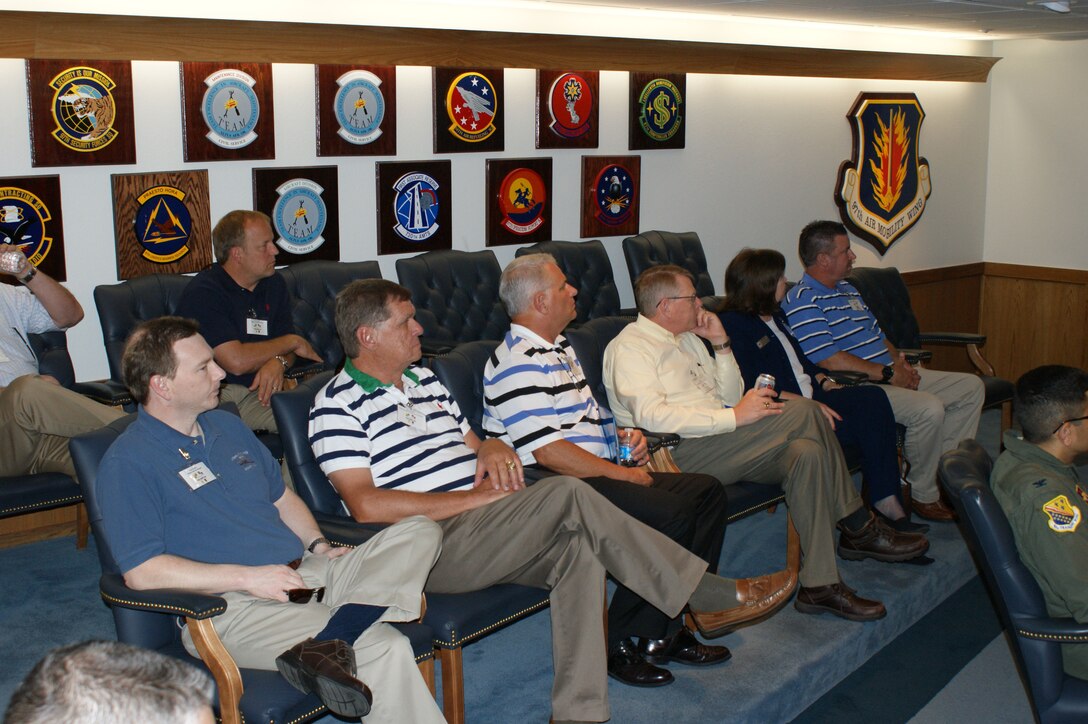 Civic leaders from the Wichita Falls area receive a mission briefing at 97th Air Mobility Wing headquarters on May 16, 2012 at Altus Air Force Base. The civic leaders took tours of Sheppard, Altus, Dover and Offutt Air Force Bases to enhance their understanding of the global Air Force mission. (U.S. Air Force photo/Dan Hawkins)