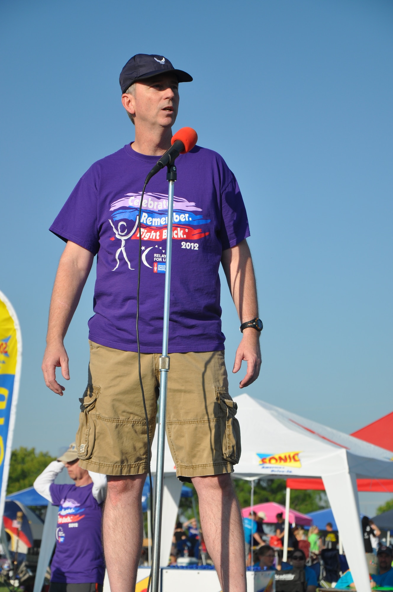 SAN ANGELO, Texas - Lt. Col. Andrew "Dixie" Cupp,17th Training Group Deputy Group Commander, speaks before the start of the 2012 Relay For Life, May 18. Cupp, who was the guest speaker, was diagnosed with melanoma (skin cancer) in December 2008 and is fighting stage 4 Metastatic melanoma. (U.S. Air Force photo/Senior Airman Anne Gathua)  