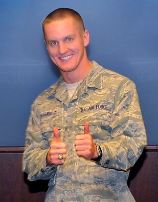 Cadet 1st Class Dustin Hayhurst poses for a photo during a ceremony recognizing him as the top graduate for the Air Force Academy's Class of 2012 May 18, 2012. Hayhurst, a native of Freeport, Fla., was also named the Air Force's top cadet May 10. (U.S. Air Force photo/Raymond McCoy)