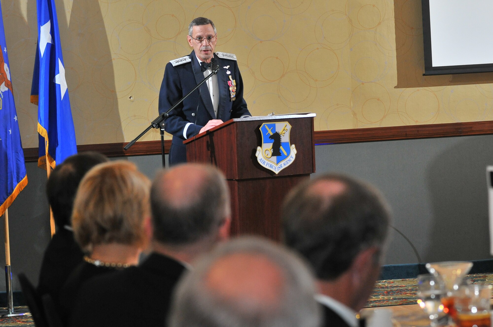 SAN ANTONIO -- Guest speaker Lt. Gen. John C. Koziol addresses attendees March 29 at the Air Force Intelligence, Surveillance and Reconnaissance Agency Annual Awards Banquet here. Koziol, the first Air Force ISR Agency commander, retires June 1 as the last uniformed member of the United States Air Force Security Service, the original iteration of the agency. (U. S. Air Force photo by William Belcher)        
