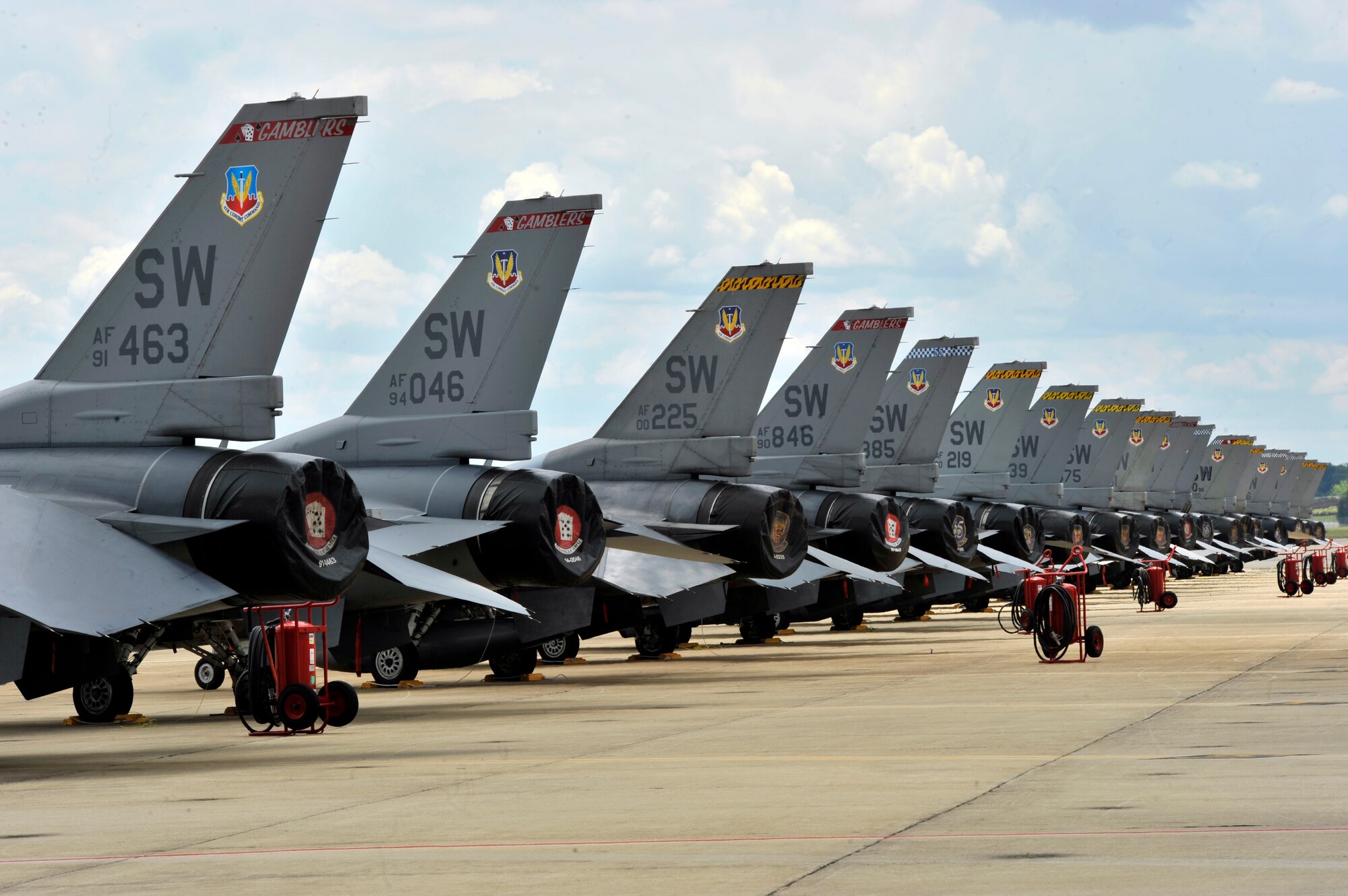 Several F-16's line up on the flight line in preparation for an Operation Readiness Exercise elephant walk at Shaw Air Force Base, S.C., May 21, 2012. An elephant walk demonstrates the 20th Fighter Wing's ability to generate aircraft in response to global taskings. (U.S. Air Force photo by Senior Airmen Tabatha McCarthy/released)