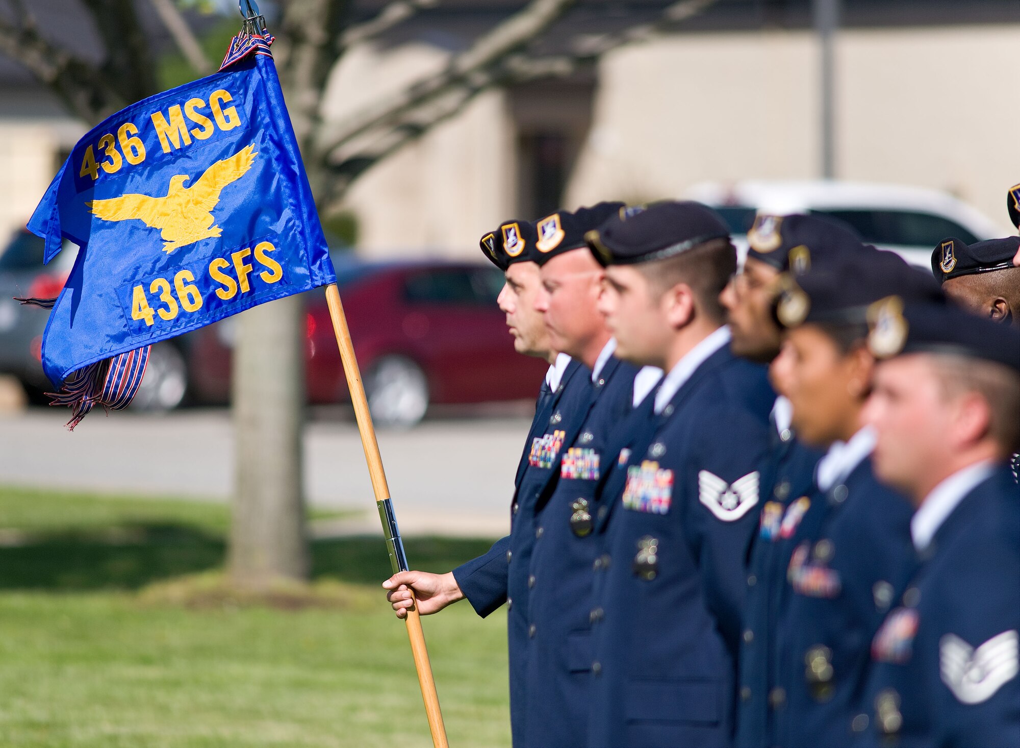 Members of the 436th Security Forces Squadron stand in formation during a retreat ceremony May 18, 2012, at Dover Air Force Base, Del. National Police Week culminated with the observance of the retreat ceremony. (U.S. Air Force photo by Roland Balik)

