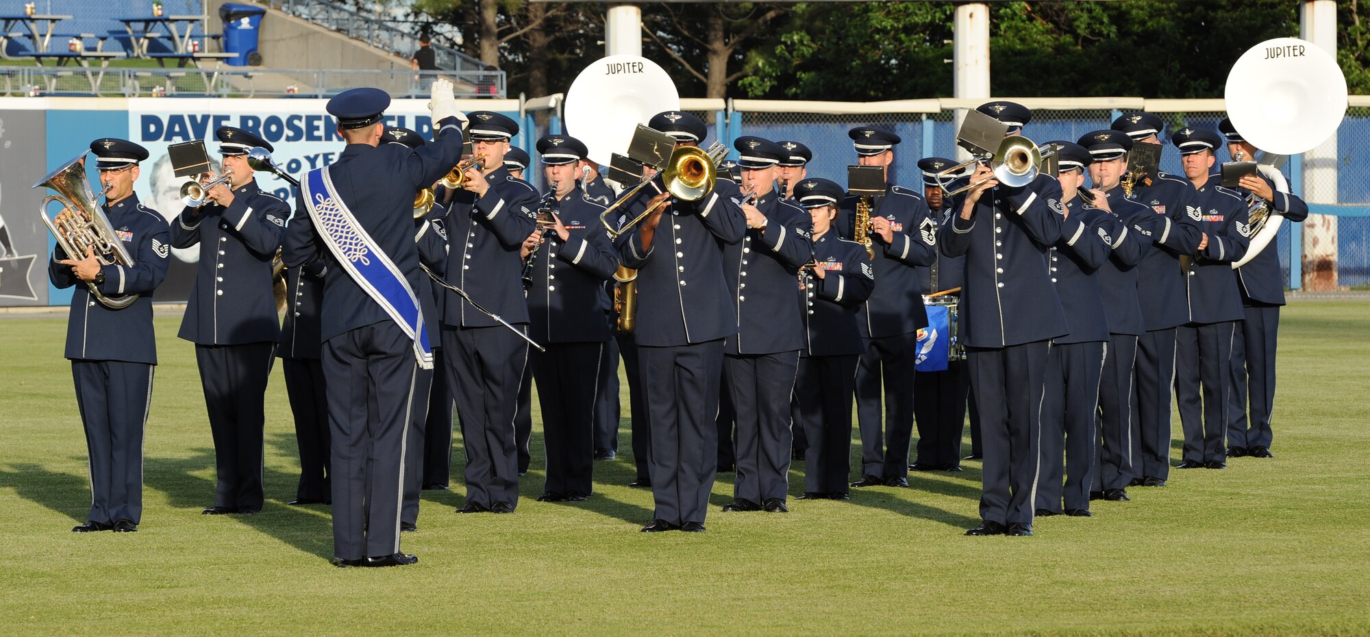 U.S. Air Force Heritage of America Band performs a medley of U.S. military anthems during the opening ceremony of the Norfolk Tides’ 17th annual Armed Forces Night at the Harbor Park Stadium in Norfolk, Va., May 19, 2012. The Tides host the event each year to honor the commitment and sacrifices of Service members from all branches of the Armed Forces. (U.S. Air Force photo by Airman 1st Class Teresa Cleveland/Released)