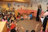 Terrye Heagerty, 902nd Force Support Squadron director, speaks with the children from the Joint Base San Antonio-Randolph Child Development Center May 18 at the JBSA-Randolph library for the kick off of the summer reading program.  (U.S. Air Force photo by Rich McFadden) 