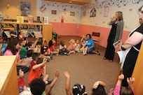 Terrye Heagerty, 902nd Force Support Squadron director, speaks with the children from the Joint Base San Antonio-Randolph Child Development Center May 18 at the JBSA-Randolph library for the kick off of the summer reading program.  (U.S. Air Force photo by Rich McFadden) 