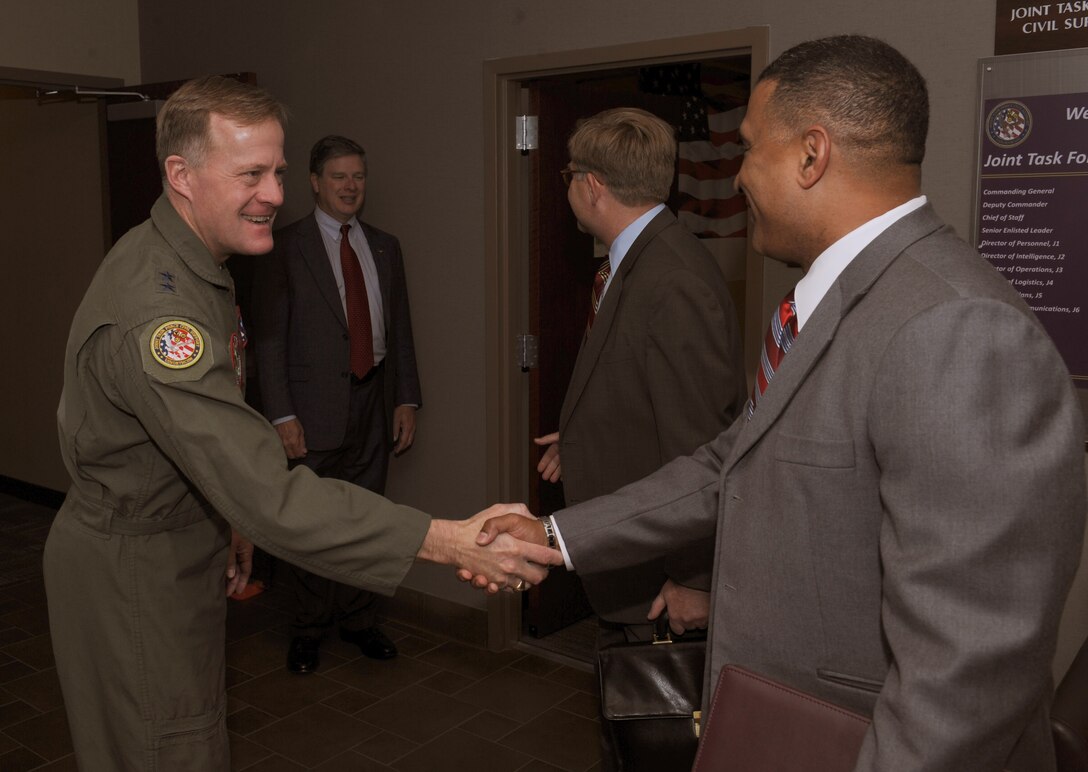 U.S. Air Force Maj. Gen. Jonathan Treacy, Joint Task Force Civil Support commander, greets Deputy Assistant Secretary of Defense Reserve Affairs (Readiness, Training and Mobilization) Paul D. Patrick, and his staff, during their visit to Fort Eustis, Va., May 11, 2012. JTF-CS commands and controls designated Department of Defense forces to assist local, state, federal and tribal partners in saving lives, preventing further injury, and providing critical support to enable community recovery. (U.S. Navy photo by Petty Officer 2nd Class Brian Dietrick/Released)
