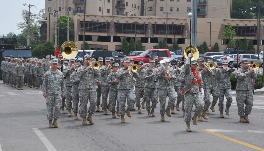 The U.S. 8th Army Band marches through Osan Air Base, Republic of Korea, during the Armed Forces parade, May 19, 2012. Starting at the main gate, U.S. and Korean military formations, and veterans, marched in honor of those Americans in uniform who served their country in times of war and peace.  (U.S. Air Force photo/Staff Sgt. Craig Cisek)