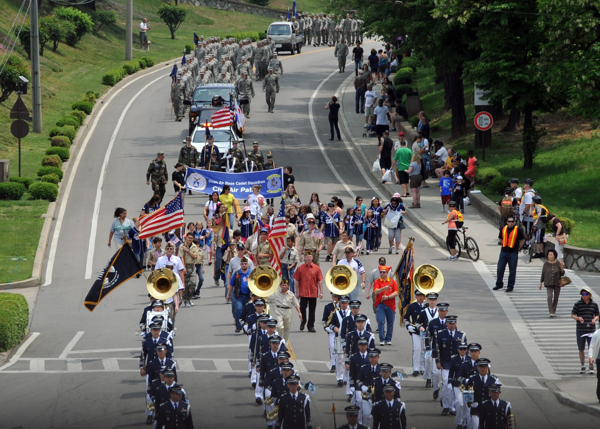 The 2012 Armed Forces Day parade winds down Songtan Boulevard, Osan Air Base, Republic of Korea, May 19, 2012. More than 800 participants from 40 different organizations encompassing the 51st Fighter Wing, 7th Air Force, 8th Army Band, and Republic of Korea Marine Band and Drill Team marched in the parade that honors Americans in uniform who served their country in times of war and peace.  (U.S. Air Force photo/Staff Sgt. Craig Cisek)