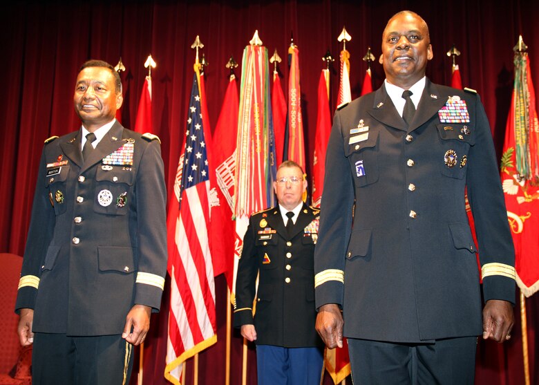 U.S. Army Corps of Engineers Commanding General Lt. Gen. Thomas P. Bostick (left),  with Command Sgt. Maj. Micheal Buxbaum (center), USACE command sergeant major, and Army Vice Chief of Staff Gen. Lloyd J. Austin III (right), following the pinning of the MacArthur Castles on Bostick.