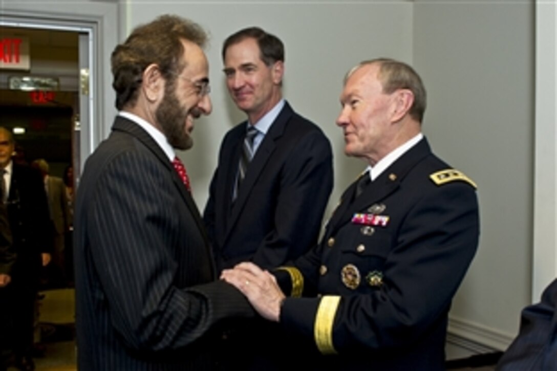 U.S. Army Gen. Martin E. Dempsey, chairman of the Joint Chiefs of Staff, greets acting Iraqi Defense Minister Sadun al-Dulaymi at the Pentagon, May 22, 2012.
