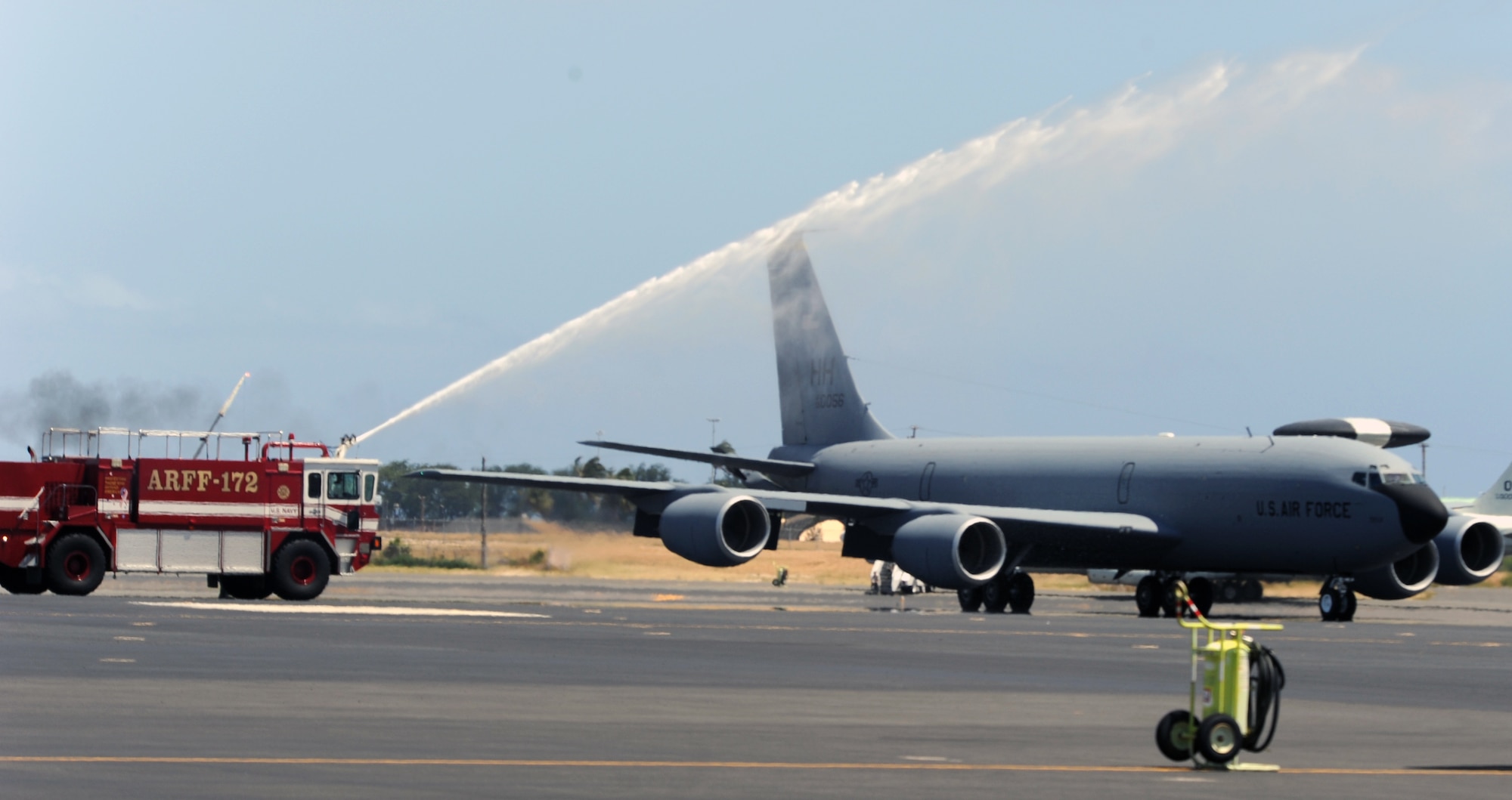 A 96th Air Refueling Squadron KC-135 Stratotanker
carrying Col. Joe Dague, 15th Wing vice commander, is doused by a firetruck
at Joint Base Pearl Harbor-Hickam, Hawaii, after landing his "fini flight"
May 23. Dague, a master navigator with more than 2,900 flight hours, has
been the 15th Wing vice commander since June 2010. (U.S. Air Force photo by
Capt. Ben Sakrisson)