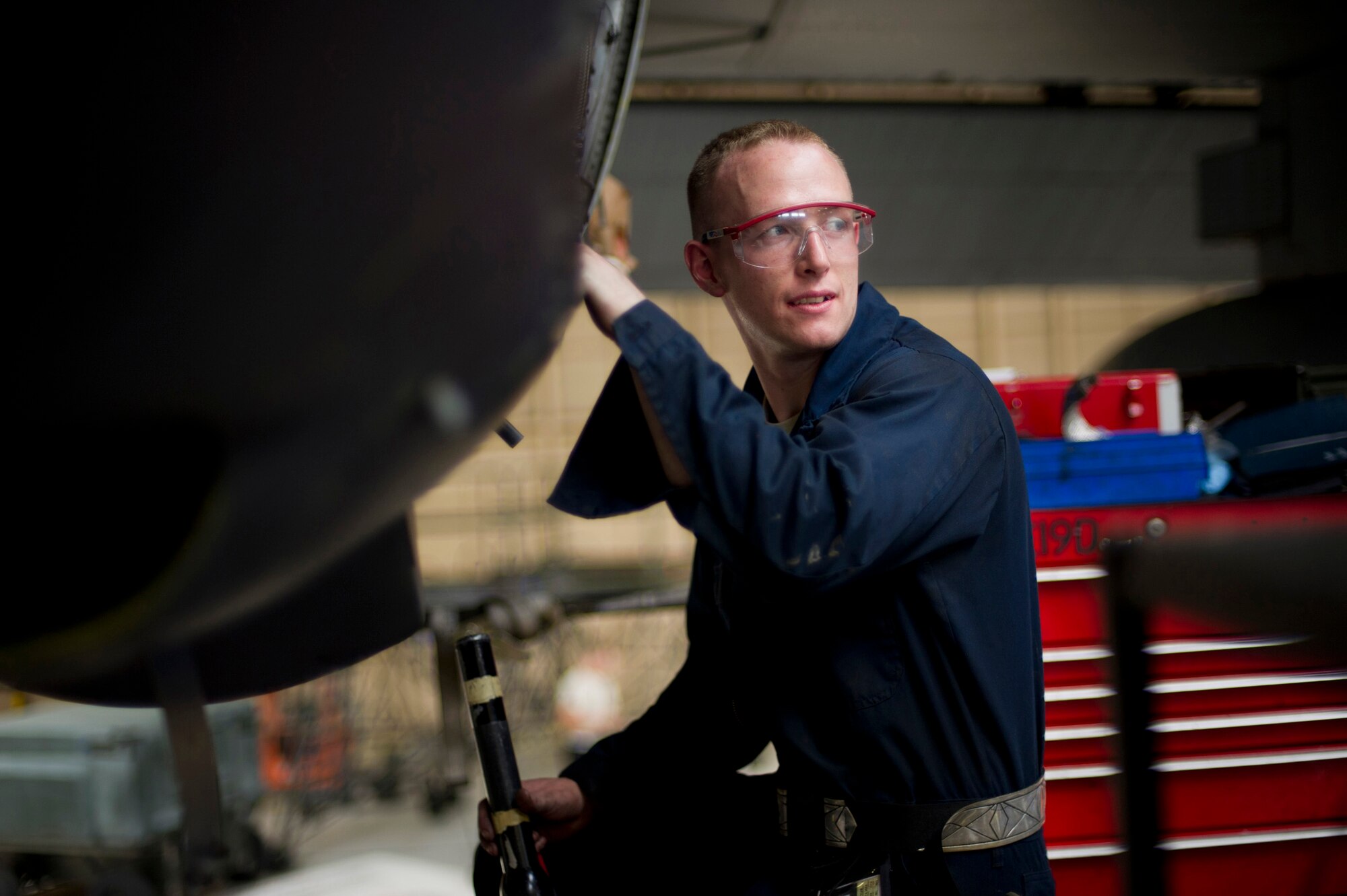 YOKOTA AIR BASE, Japan -- Senior Airman Joshua Collins, 374th Maintenance Squadron, changes out a burner drain valve gasket during an isochronal inspection on a C-130 Hercules May 14, 2012, at Yokota Air Base, Japan. The inspection consists of dividing the plane into five sections, allowing Airmen to examine each section individually.  (U.S Air Force photo by Staff Sgt. Stacy Moless)