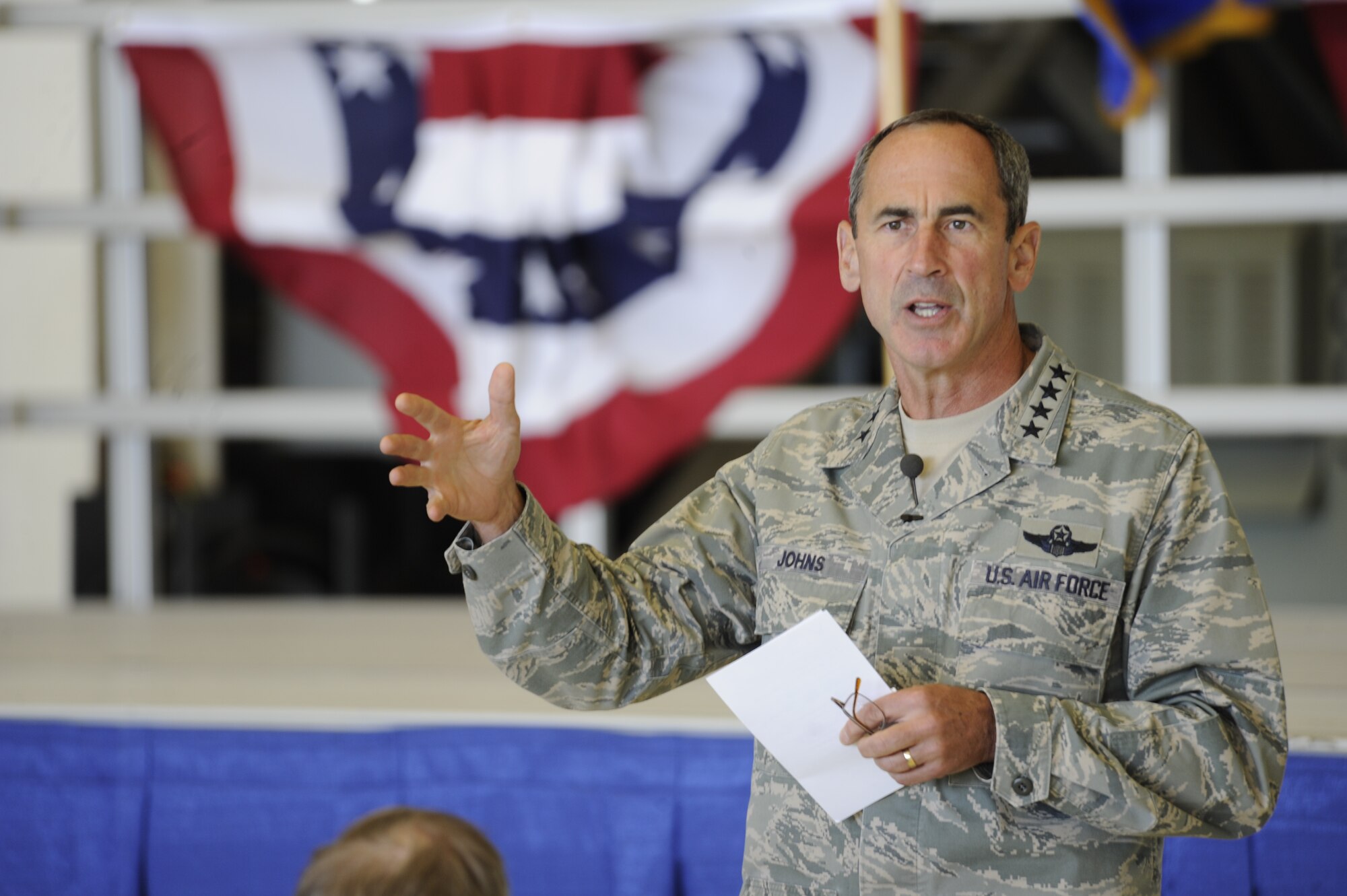 Gen. Raymond Johns, Jr., Air Mobility Command commander, speaks to the 92nd and 141st Air Refueling Wings during the base ‘all call’ May 18, 2012 in Hangar 2050 at Fairchild Air Force Base, Wash. More than 300 Airmen listened to the four-star’s priorities and asked questions about the new KC-46A tanker, the Department of Defense budget and Fairchild’s operations tempo. (U.S. Air Force photo by Airman 1st Class Ryan Zeski/Released)