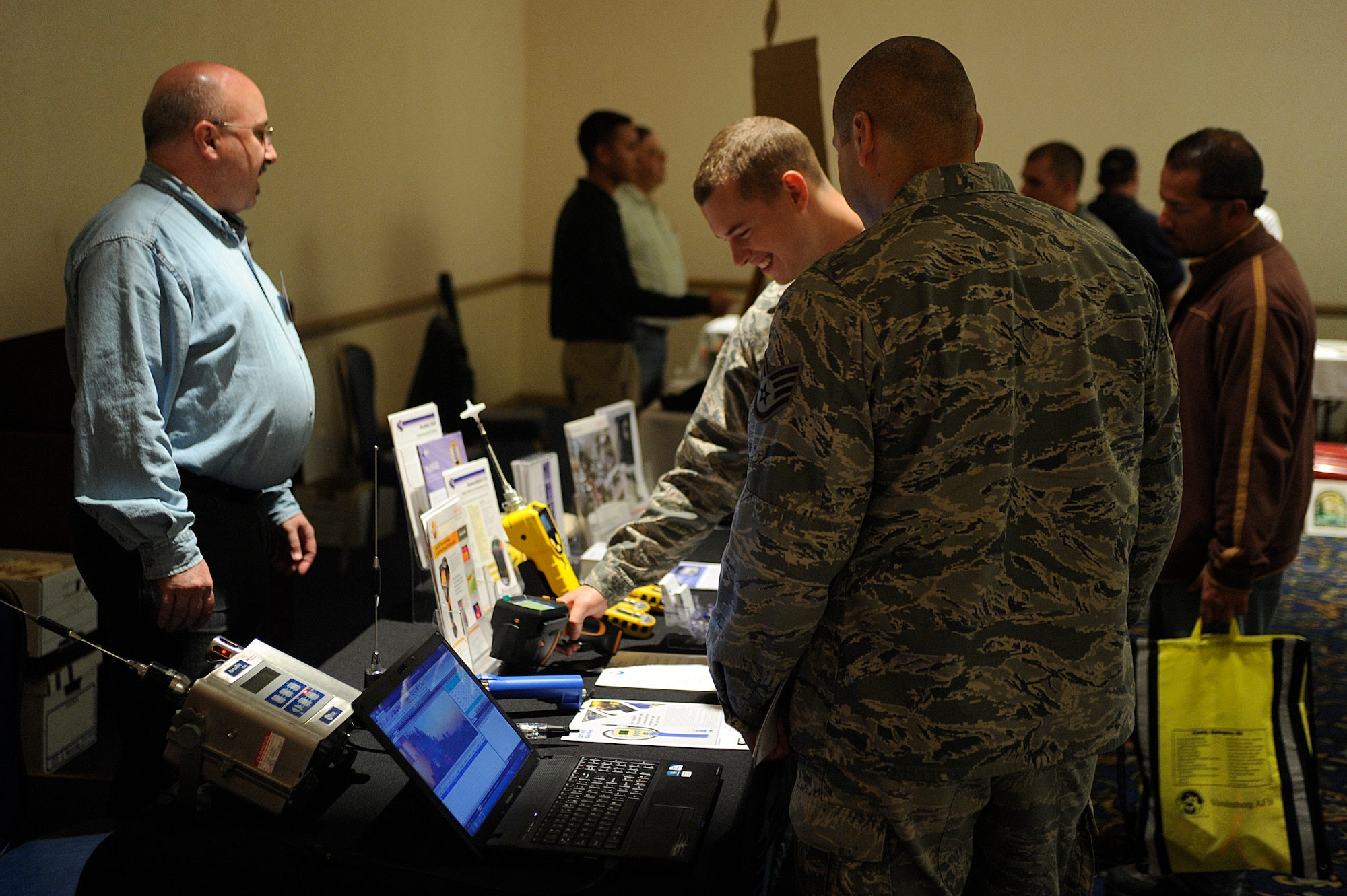 VANDENBERG AIR FORCE BASE, Calif. -- Team V members view displays during a  safety expo at the Pacific Coast Club here Wednesday, May 23, 2012. Multiple organizations participated in the expo to show safety equipment and services they provide on and off base. (U.S. Air Force photo/Staff Sgt. Andrew Satran)  