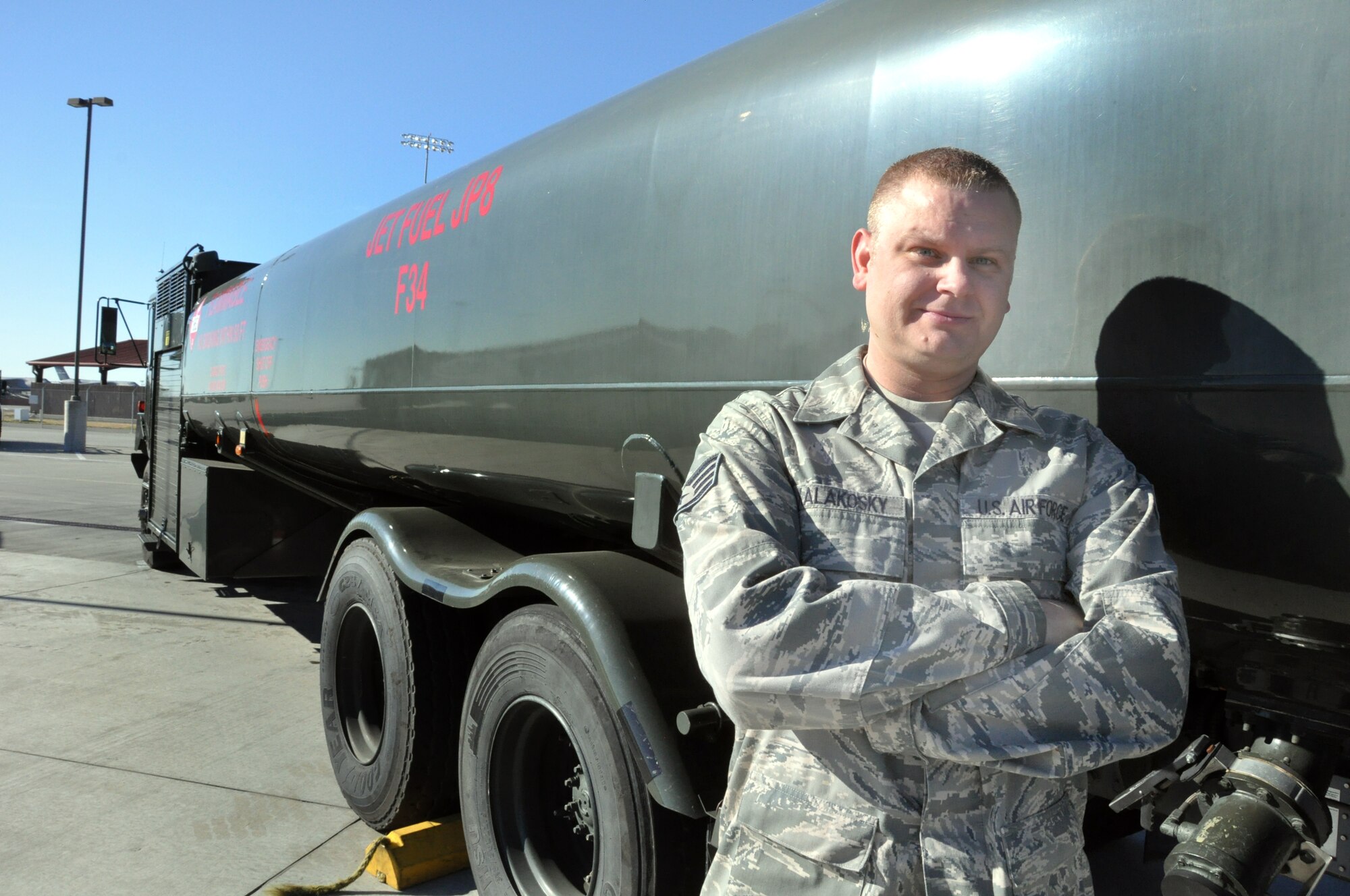 Staff Sgt. Rich Kalakosky, 60th Logistics Readiness Squadron fuels distribution supervisor, stands with an R-11 refueling truck 22 May in the fules yard on base. Kalakosky uses the turck to bring Jet Propellant-8 from bulk storage facilities to refuel Travis aircraft in his duties. (U.S. Air Force photo/Staff Sgt. Patrick Harrower)