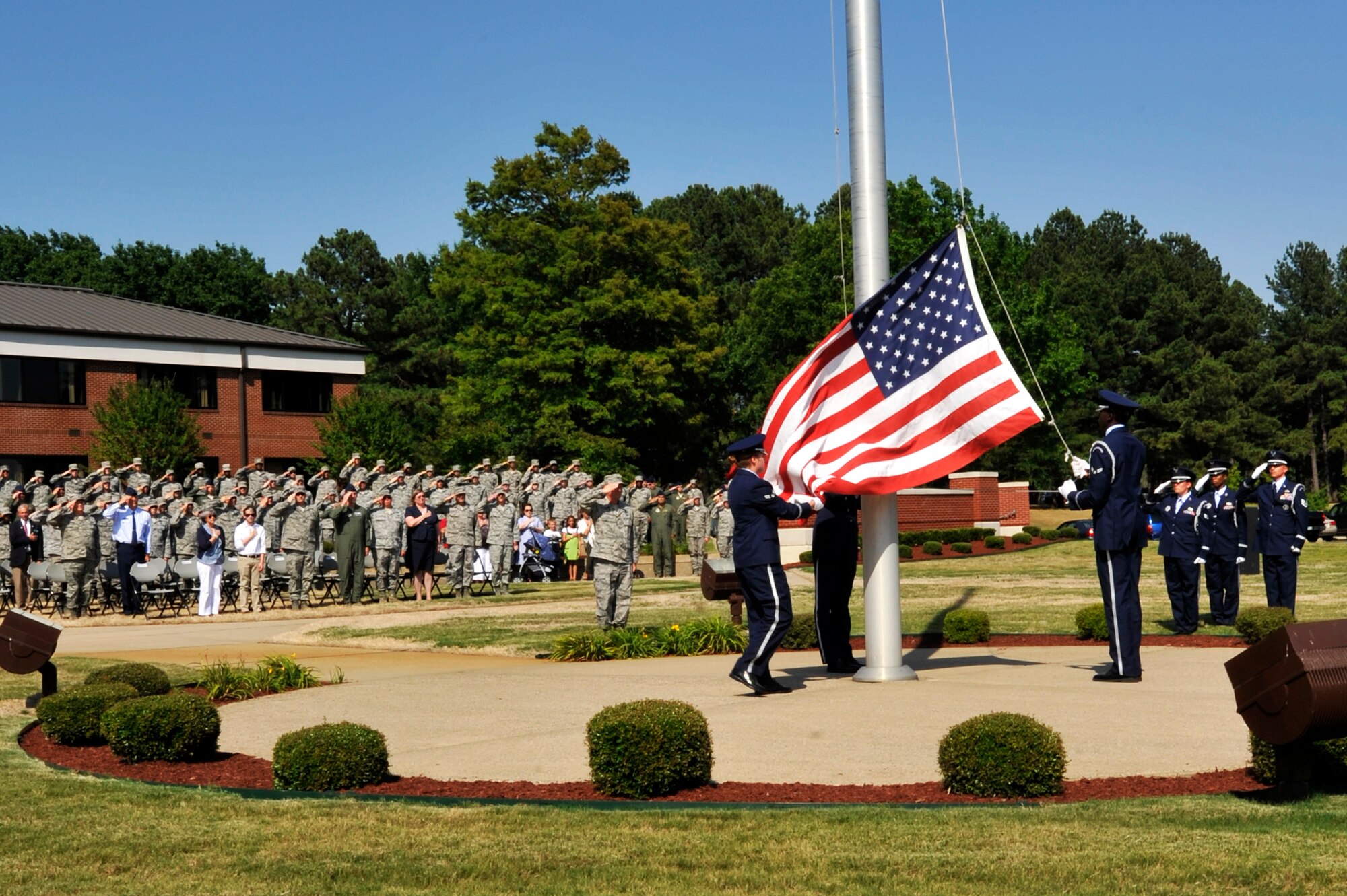 Col. Steve Eggensberger, 189th Airlift Wing commander, salutes during the Memorial Day Retreat Ceremony May 23, 2012, at Little Rock Air Force Base, Ark. Memorial Day, first known as Decoration Day, was established in 1868 as a time for the nation to decorate the graves of the war dead with flowers. (U.S. Air Force photo by Airman 1st Class Rusty Frank)
