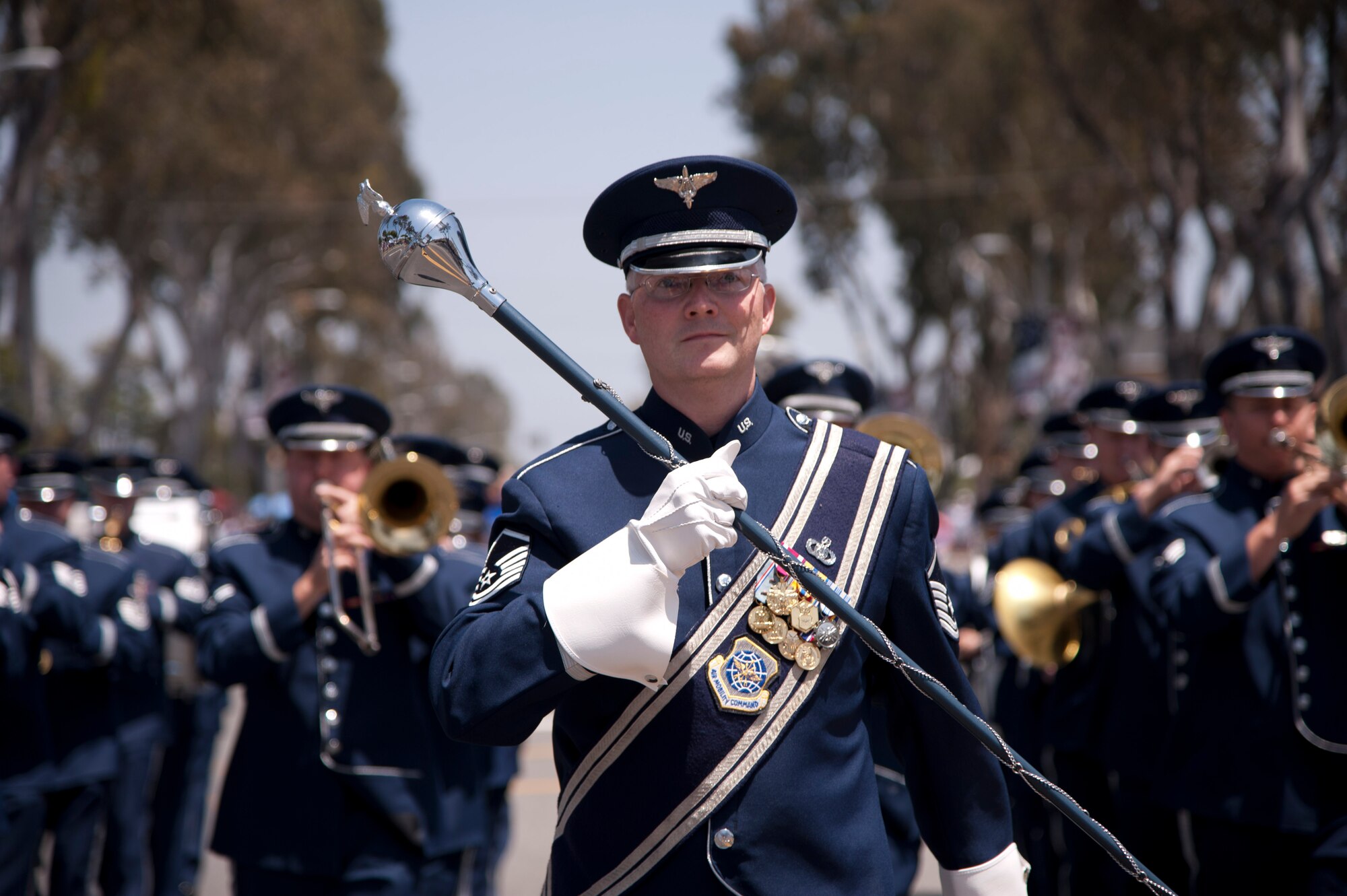 Master Sgt. Henry Dodd Martin, USAF Band of the Golden West drum major, leads the band during the Armed Forces Day parade in Torrance, CA Saturday.