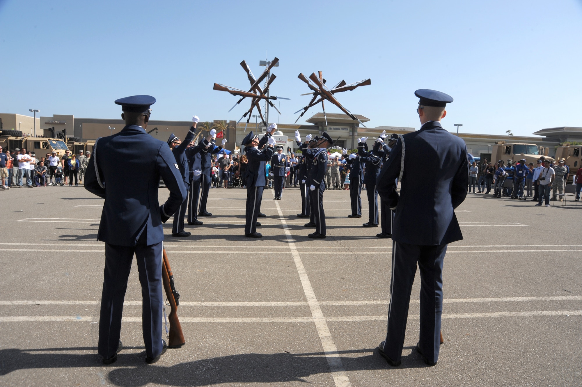 Members of the U.S. Air Force Honor Guard Drill Team perform at Del Amo Mall during the Torrance Armed Forces Day Celebration, May 19.  (Photo by Joe Juarez)